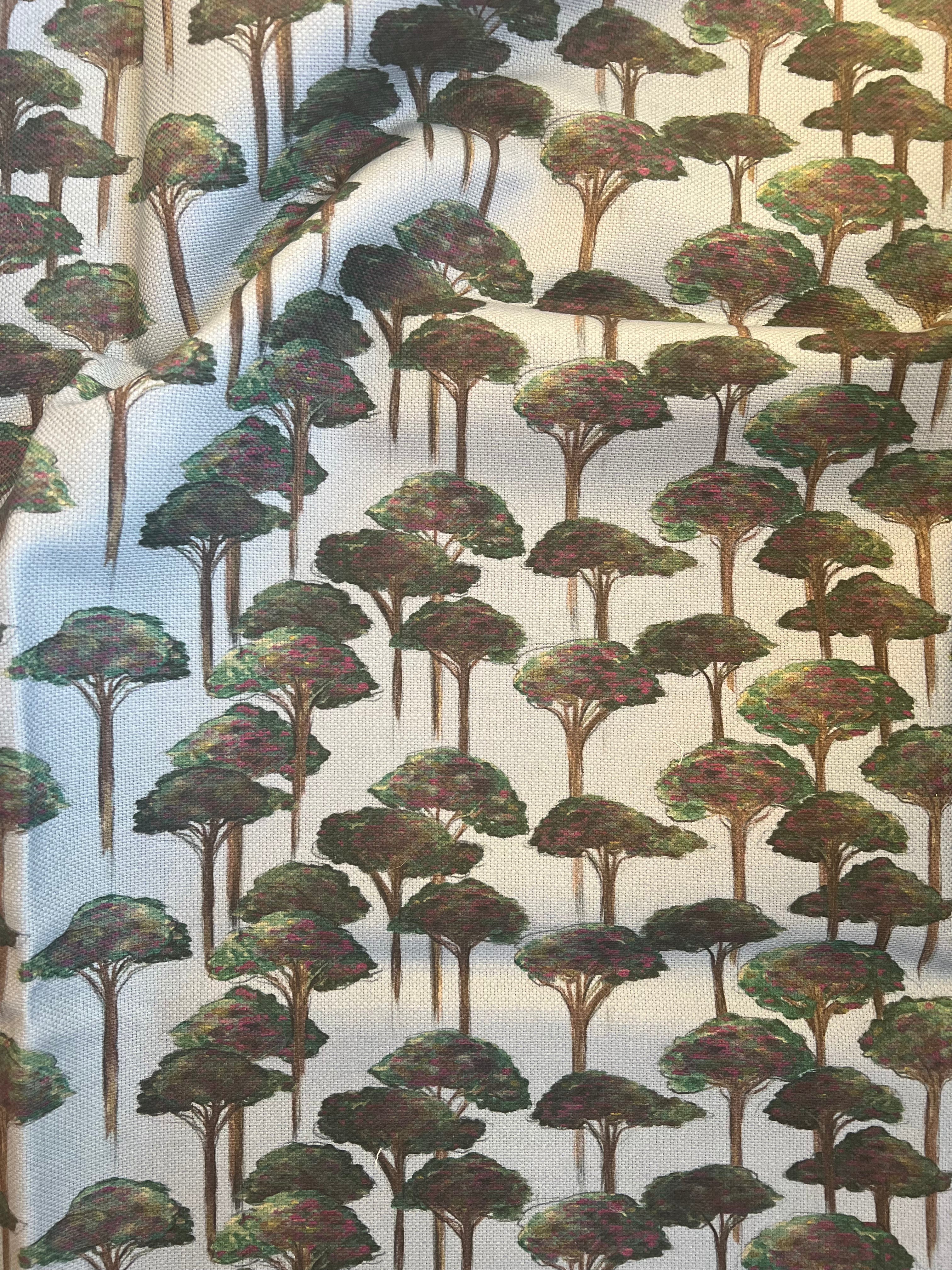 A textile pattern featuring a repeated design of umbrella pines.