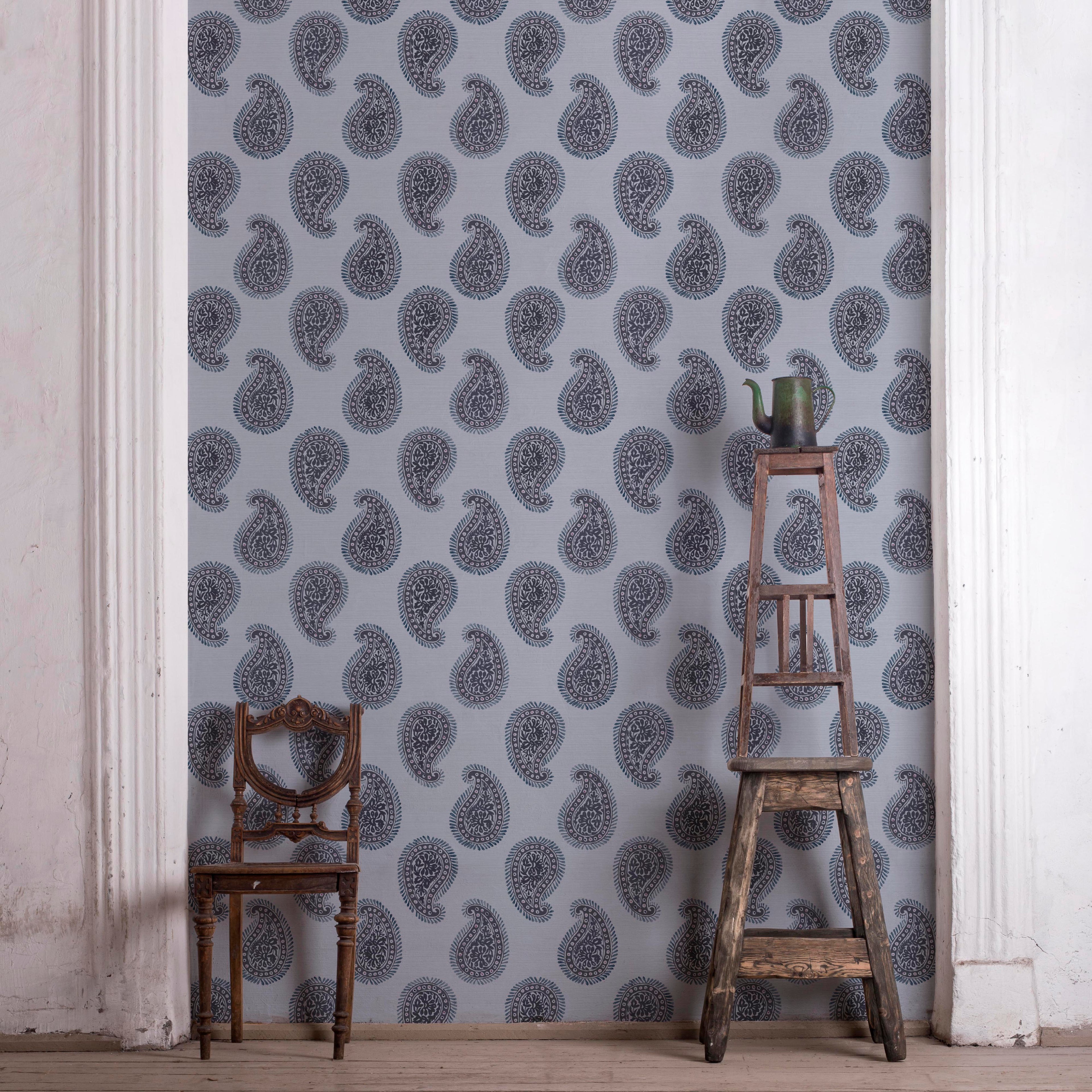 Large-format paisley wallpaper with hand-painted botanical art