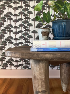 Sustainable wallpaper featuring Roman pine tree motif