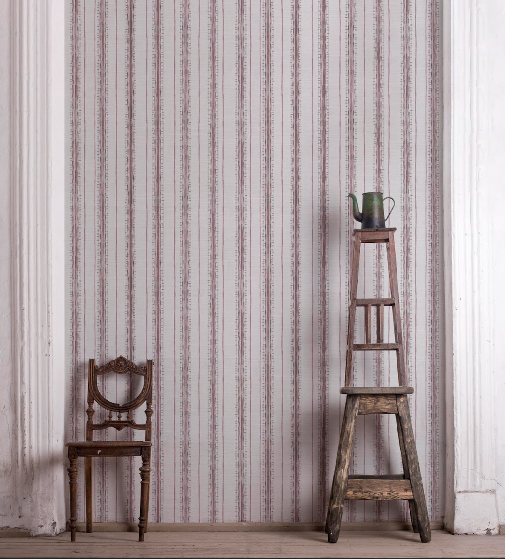 Sustainable grasscloth wallpaper featuring painterly stripes