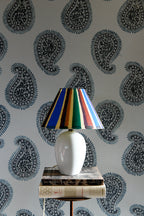 Large-format paisley wallpaper with hand-painted botanical art